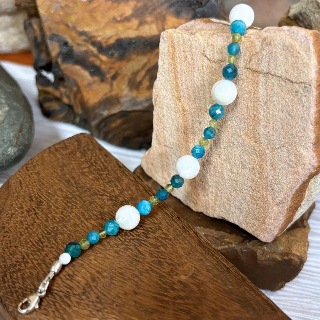an image of a Mother of Pearl with Apatite and Peridot Bracelet