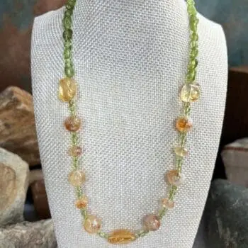 an image of a Citrine and Peridot Gemstone Necklace with assorted shapes of citrine beads and small round peridot beads and peridot small nuggets