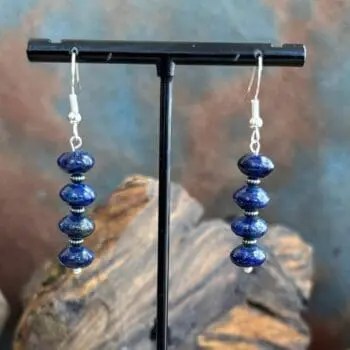 an image of a pair of Rondelle Lapis Lazuli and Sterling Silver Earrings with four rondelle beads separated by oxidized small sterling beads.