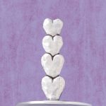 Upright ring holder with stacked hearts
