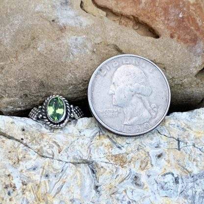 Oval Peridot Faceted Ring set in Sterling Silver