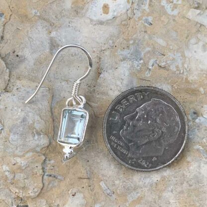 Petiite Blue-Topaz Rectangle Sterling Silver Dangle Earring Next to Dime