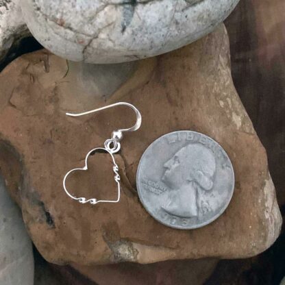 an image of a pair of Sterling Silver Angled Dangle Heart Earrings