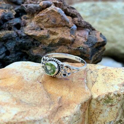 Round Sterling Silver and Peridot Dainty Ring Side Angle