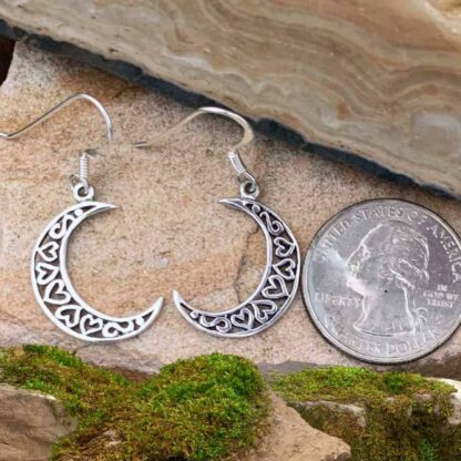 Sterling Silver Crescent Moon Heart Earrings Next to Quarter