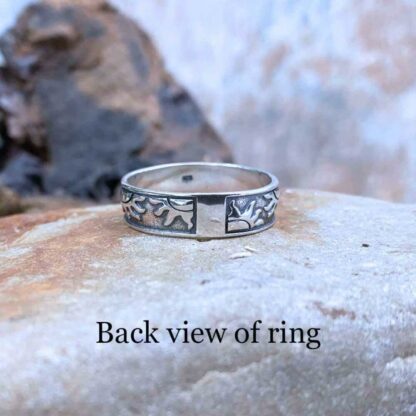 an image of the back side of our Sterling Silver Half Suns Ring with half suns wrapping around this band style ring