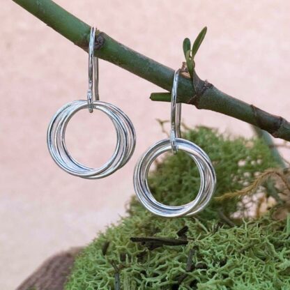 Photo of Sterling Silver multiple circles hanging from ear wire.