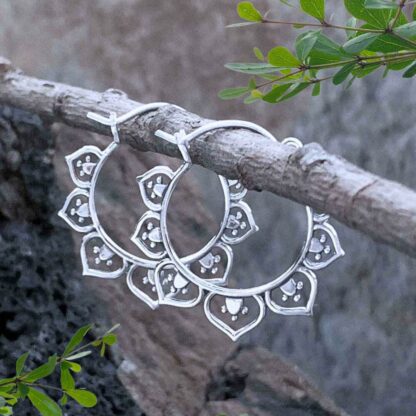 an image of sterling silver lotus click hoop earrings