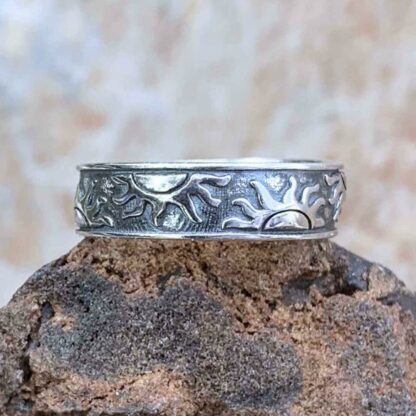 an image of a Sterling Silver Half Suns Band style Ring with half suns wrapping around the band