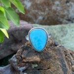 Soft Triangle shaped Larimar ring in a simple sterling silver setting.