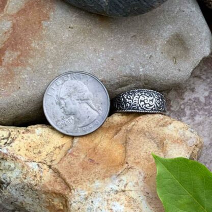 Ornate Sterling Oxidized Ring Next To Quarter