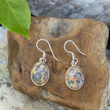 Oval Dangle Leopard Skin Jasper Pierced Earrings set in Sterling Silver. Earth tones spots reminiscent of spots of a leopard are on the stone.