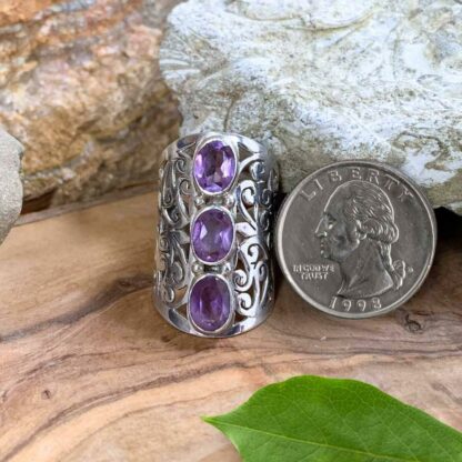 Triple Amethyst Statement Ring with filigree sterling silver work next to quarter for perspective