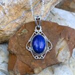 Photo of Sterling Silver Filigree surrounding an Oval Shaped Lapis Lazuli Pendant