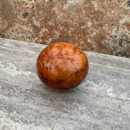 Overhead view of Medium Round Moroccan Thuya Wood Box that is 5 inches wide by 3 inches high