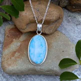 Beautiful Oval Larimar Pendant set in Sterling Silver. 2 inch total drop x Width of .928 inches
