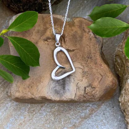 Sterling Silver Side Angled Open Heart Pendant that has a total drop of .63 inches