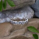 Sterling Silver Ocean Waves Beach Ring showing connecting esses that look a bit like waves in a narrow band