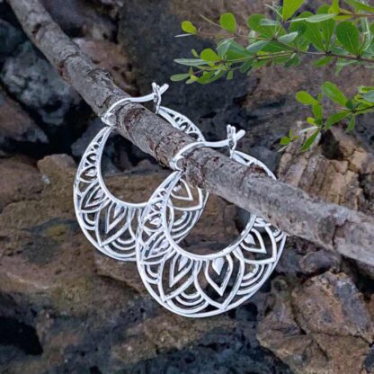 An image of a pair of round filigree Sterling Silver Lotus Mandala Click Hoop Earrings. Dimensions are 1.10 inches wide × 1.14 inches high ×0.04 in thick