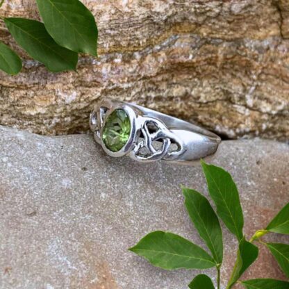 An image of a side view of our Peridot & Sterling Silver Celtic Knot Ring