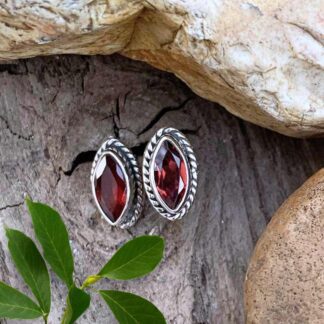 an image of a pair of Sterling Silver and Marquise Garnet Stud Earrings