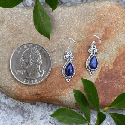 an image of a pair of Princess Teardrop Lapis Lazuli and Sterling Silver Earrings next to a quarter