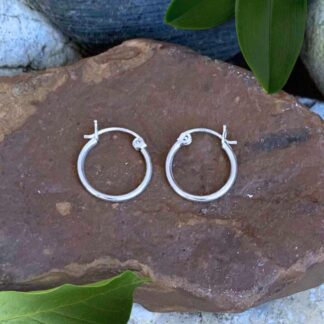 an image of simple Petite Sterling Click Hoop-Earrings that are .62 inches in diameter