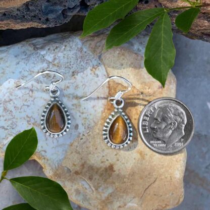 an image of our Tiger's Eye and Sterling Silver Teardrop Earrings next to a dime