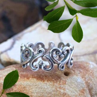 an image of a Sterling Silver Open Wraparound Hearts Ring with a series of Swirling style open hearts.