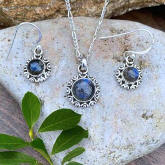 an image of a round pendant and round earrings in a Sterling Silver and Labradorite Sunburst Jewelry Set