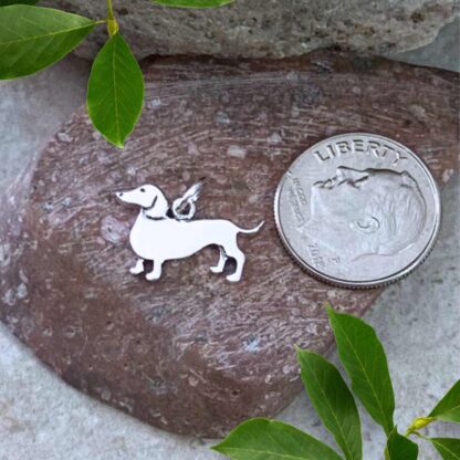 an image of a Dachshund Sterling Silver Charm next to a dime