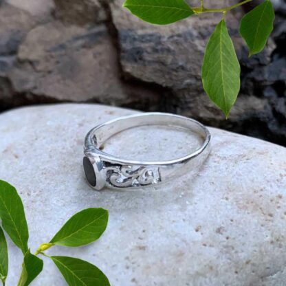 an image of a side view of a Dainty Oval Black Agate and Sterling Silver Filigree Ring