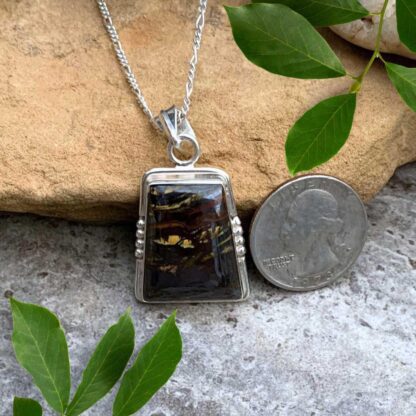 an image of a rectangular Sterling Silver and Tiger Iron Stone Pendant