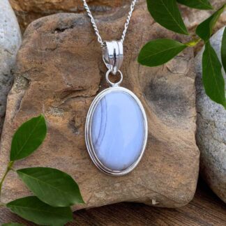 an image of an oval Blue Lace Agate and Sterling Silver Pendant with a 1.496 total drop
