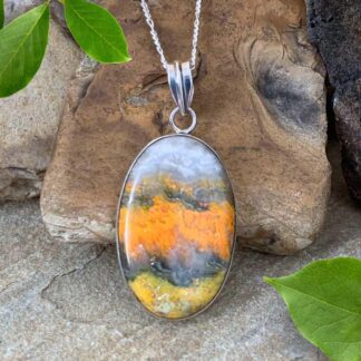 an image of a large Oval Bumblebee Jasper and Sterling Silver Pendant with a 2.125 total drop x Width of 1 inch