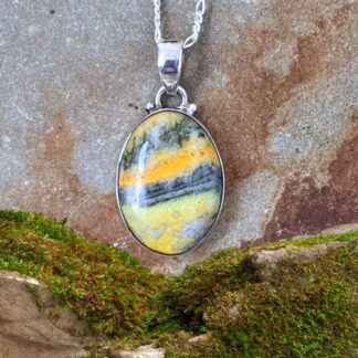 an image of a Modest Bumblebee Jasper and Sterling Silver Oval Pendant with total drop of 1.375 inches and width of .688 inches