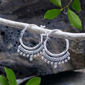 an image of a pair of petite Petite Bohemian Sterling Click Hoop Earrings with a row of sterling silver tiny beads along the bottom