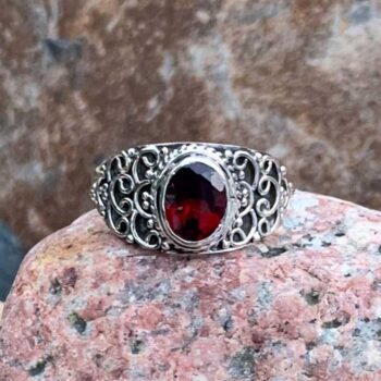 an image of an Ornate Sterling Silver and Faceted Garnet Ring