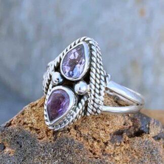 an image of a side view of a double teardrop Amethyst and sterling silver ring