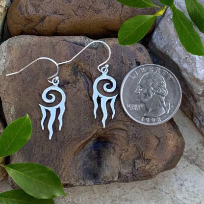 an image of a pair of Sterling Silver Flaming Spiral Dangle Earrings next to a quarter