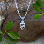 an image of a Petite Sterling Silver Interlocking Double Heart Pendant