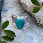 an image of an Elegant Sterling Silver and Teardrop Turquoise Statement Ring