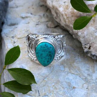 an image of an Elegant Sterling Silver and Teardrop Turquoise Statement Ring