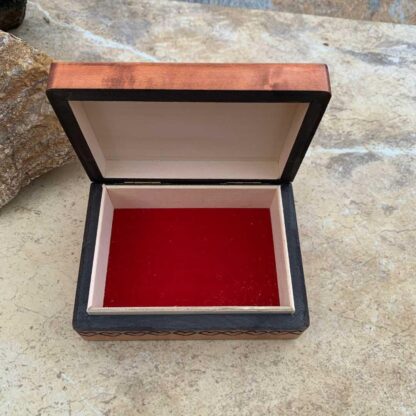 an image of the inside of a Handcrafted Simple Two Hearts Keepsake Box showing the red velvet lining on the bottom