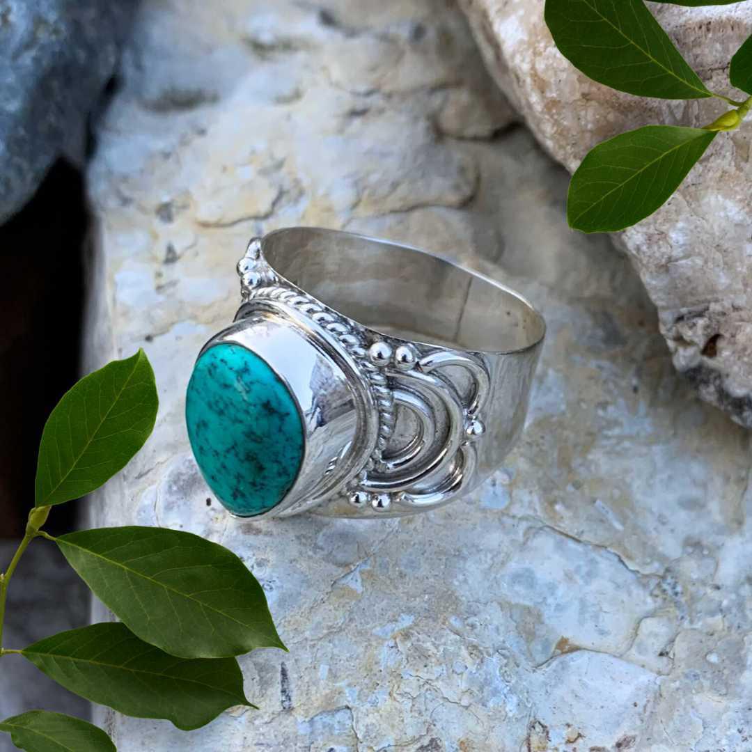 an image of an Elegant Sterling Silver and Teardrop Turquoise Statement Ring