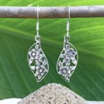an image of a pair of Sterling Silver Floral Dangle Earrings with two flowers on each earring
