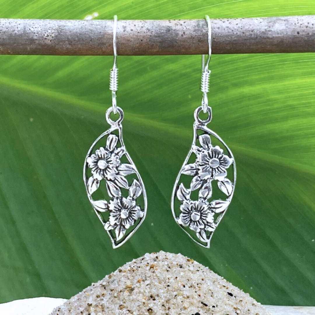 an image of a pair of Sterling Silver Floral Dangle Earrings with two flowers on each earring