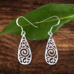 an image of a pair of Sterling Silver Swirl Dangle Earrings with open filigree design