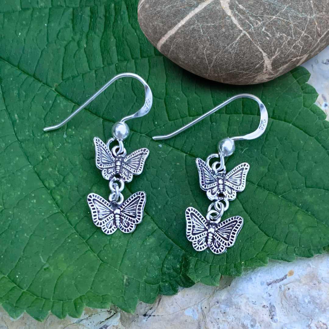 an image of a lightweight pair of Oxidized Sterling Silver Double Butterfly Dangle Earrings