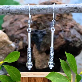 an image of a vertical pair of sterling stick style dangle earrings with a Bali design on the bottom section. Nice subtle boho look with medium dangle.